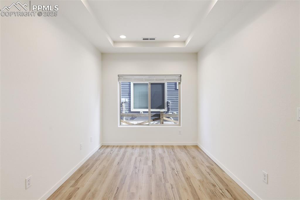 Image 13 of 36: Office of flex room