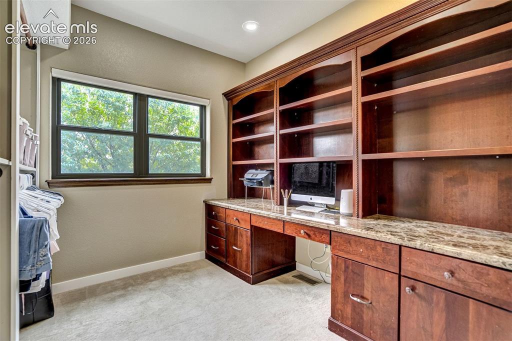 Image 19 of 46: Primary walk in closet