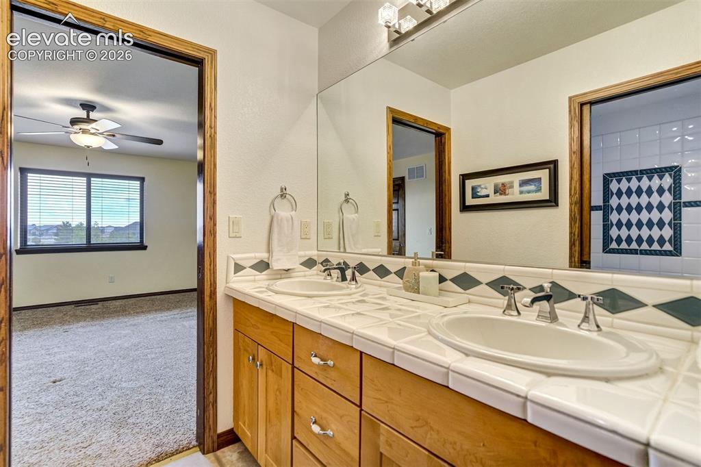 Image 21 of 46: jack & jill bathroom between bedroom 1&2