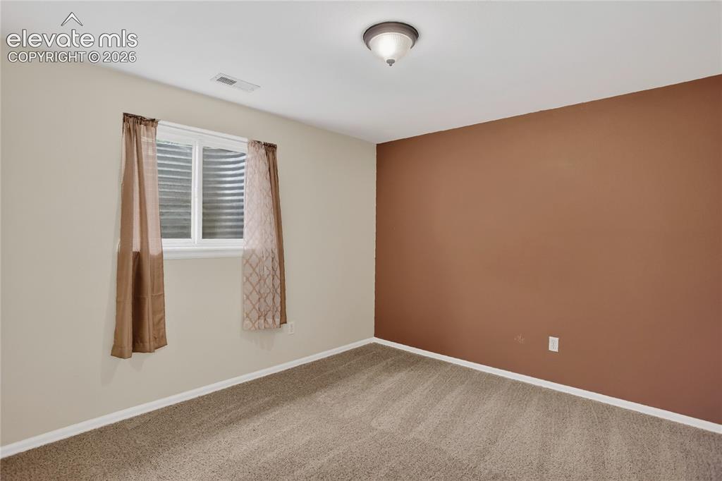 Image 13 of 20: Bedroom 3 - basement level