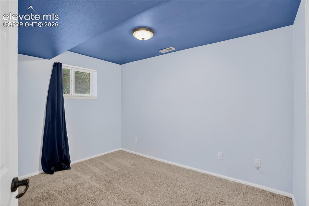 Image 14 of 20: Bedroom 4 - basement level
