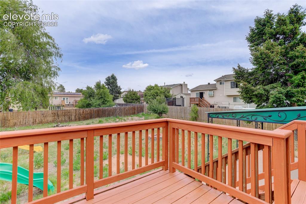 Image 16 of 20: Deck off of dining area