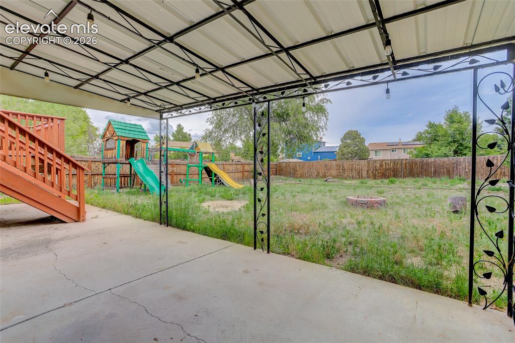 Image 17 of 20: Covered patio off of office