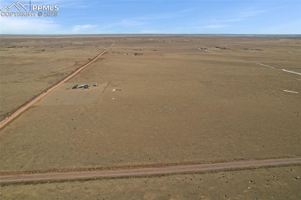 Image 8 of 8: View of rural area with a desert landscape