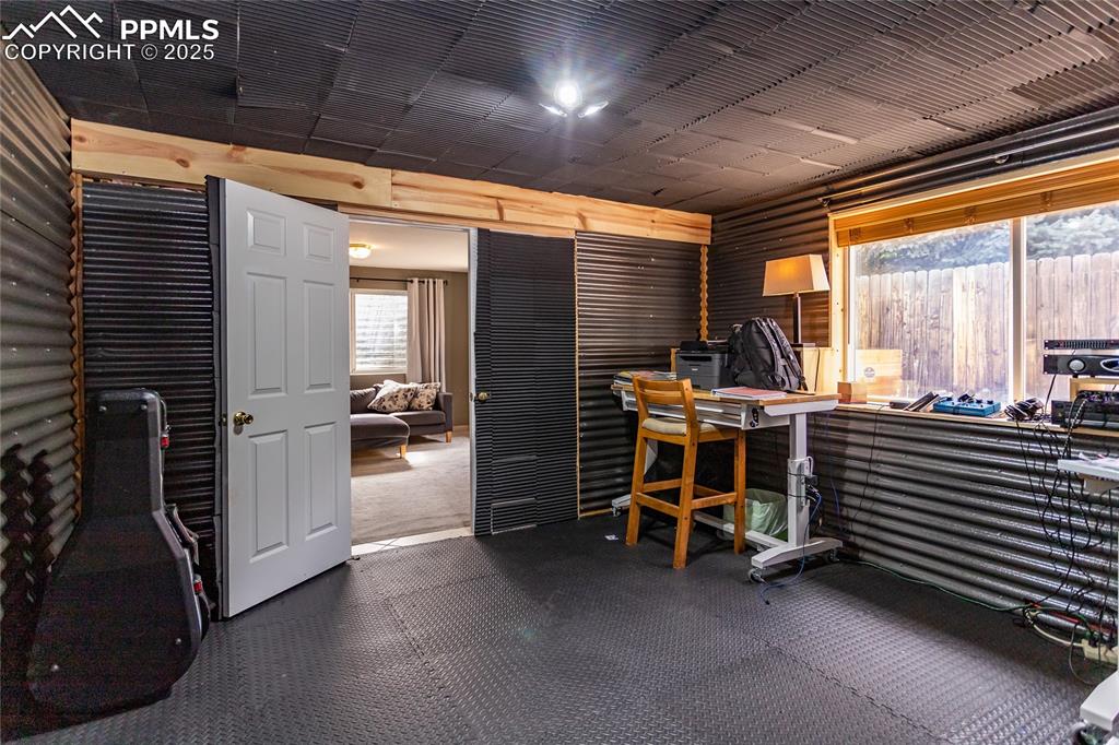 Image 39 of 47: Musicians or students in band soundproof room