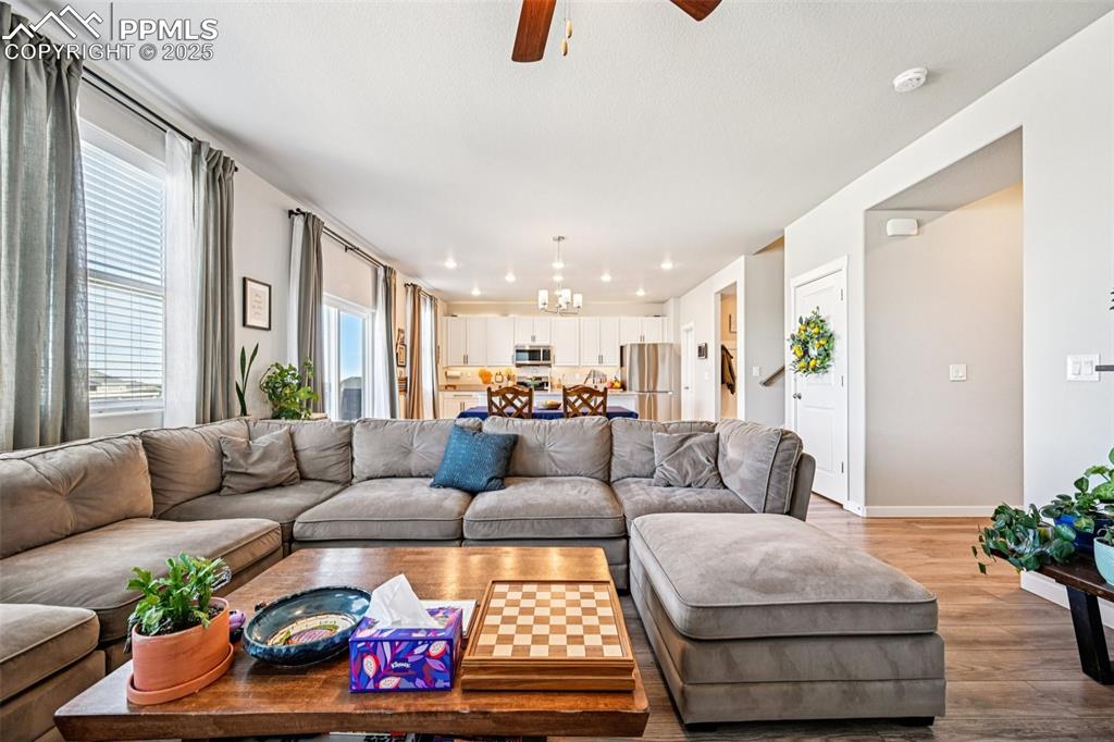 Image 11 of 50: Open concept living room, dining room and kitchen