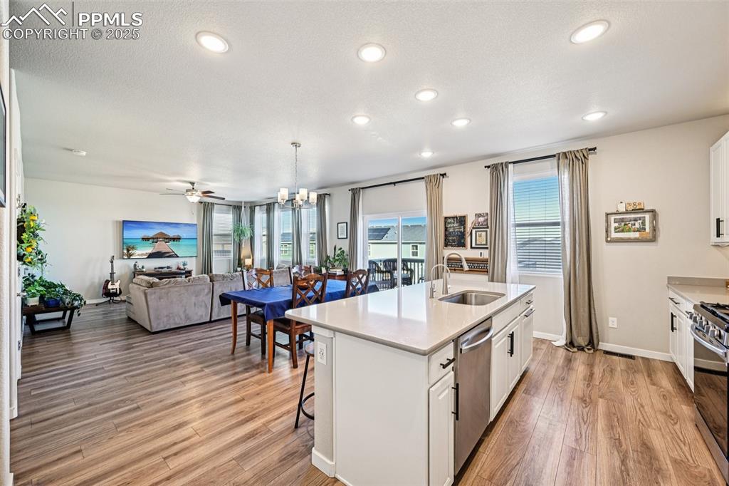 Image 17 of 50: Open concept kitchen, dining room and living room.