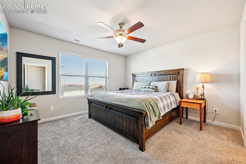Image 25 of 50: Primary bedroom with en suite bathroom