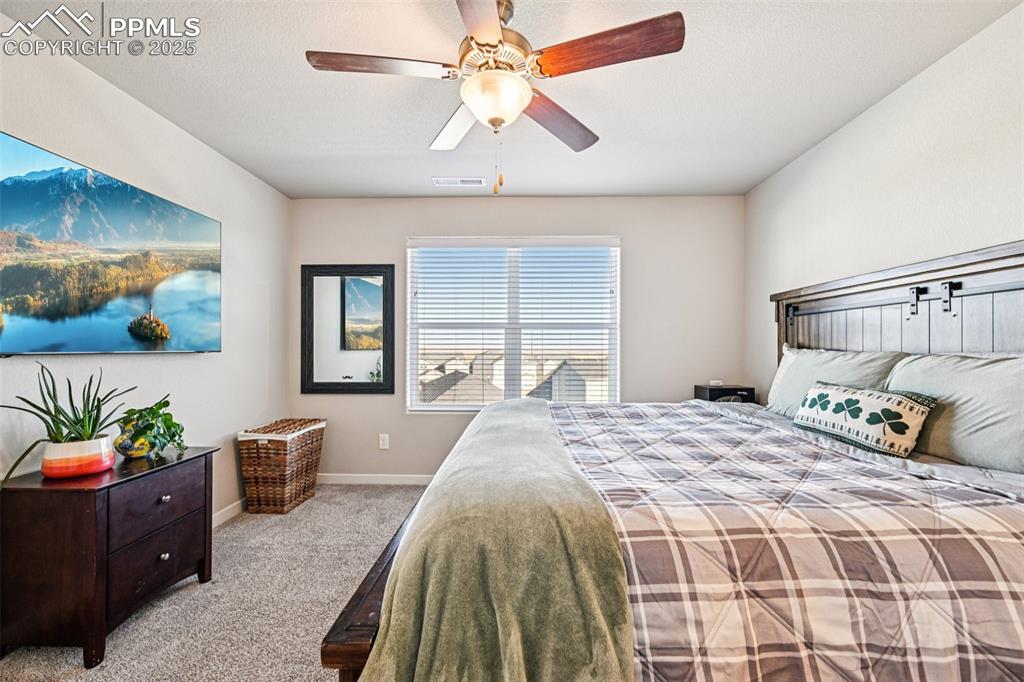 Image 27 of 50: Primary bedroom with en suite bathroom