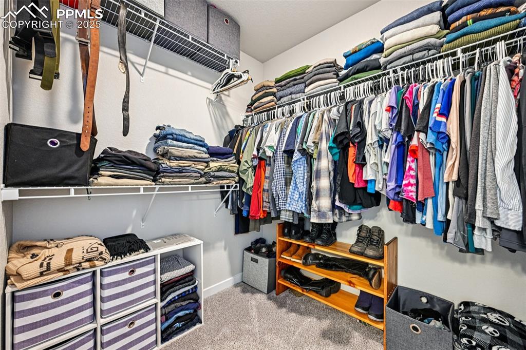 Image 31 of 50: Primary walk in closet