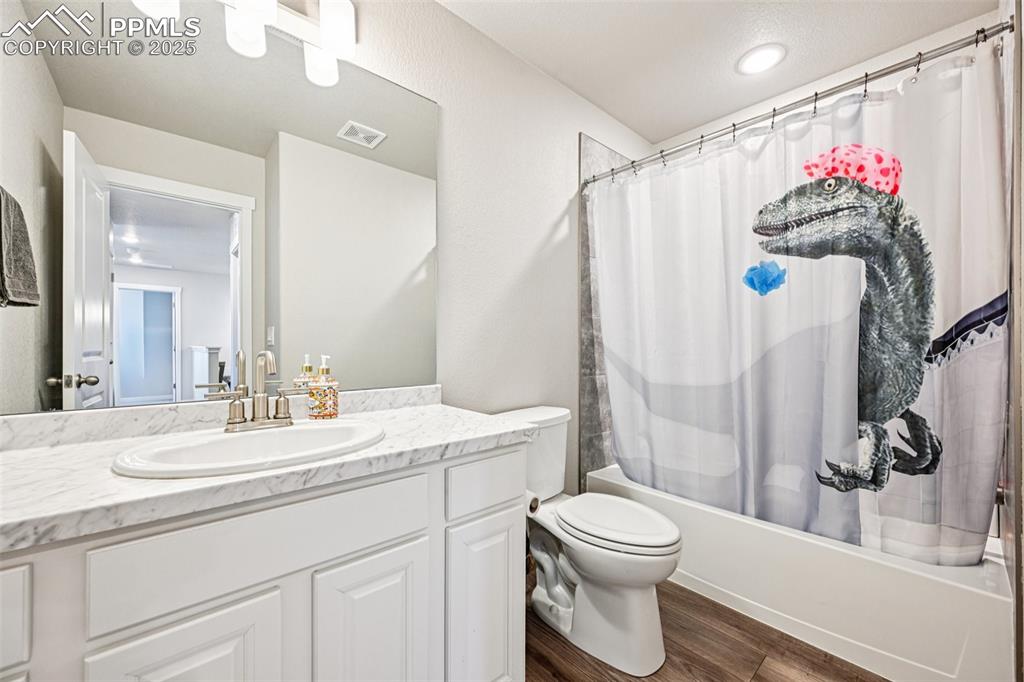 Image 34 of 50: Full bathroom conveniently located near bedroom 2 and 3