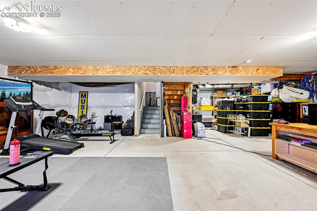 Image 42 of 50: Unfinished basement with a walk out 