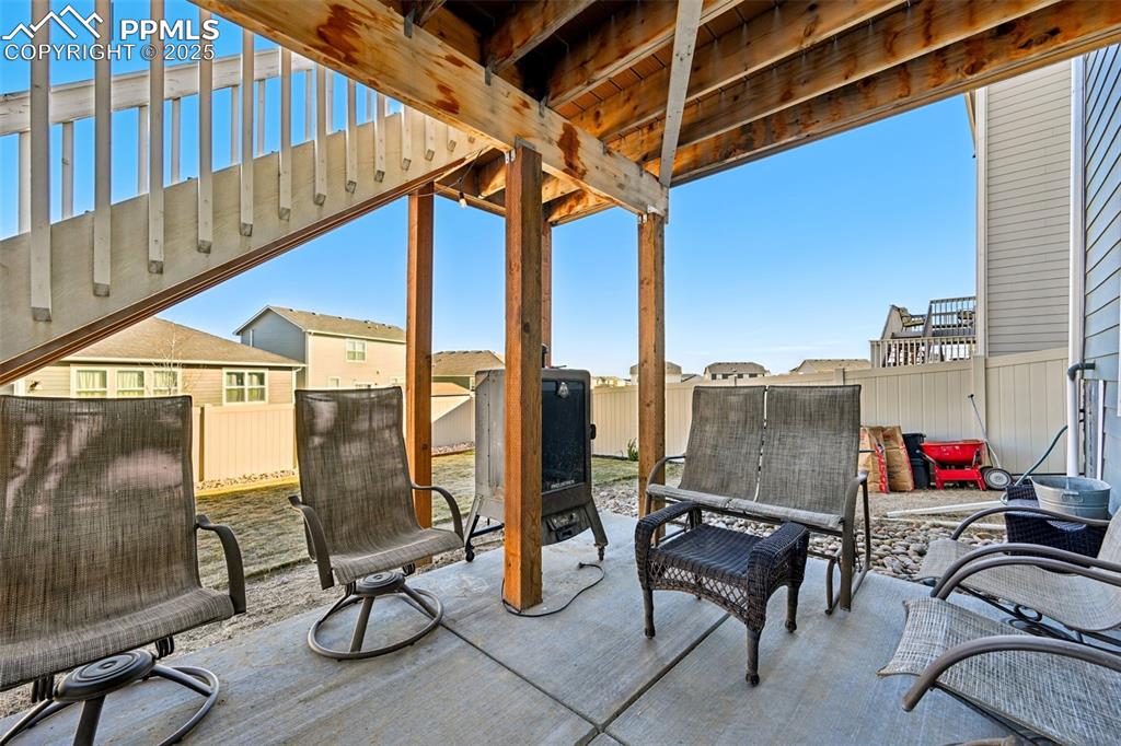 Image 43 of 50: Walk out patio off basement 