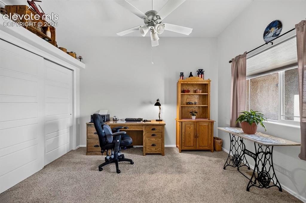 Image 30 of 40: BR. #3Spacious room featuring vaulted ceilings and a ceiling fan
Bedroom#3