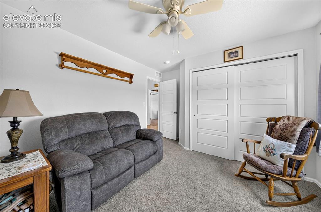 Image 31 of 40: BR. #3Spacious room featuring vaulted ceilings and a ceiling fan
Bedroom#3