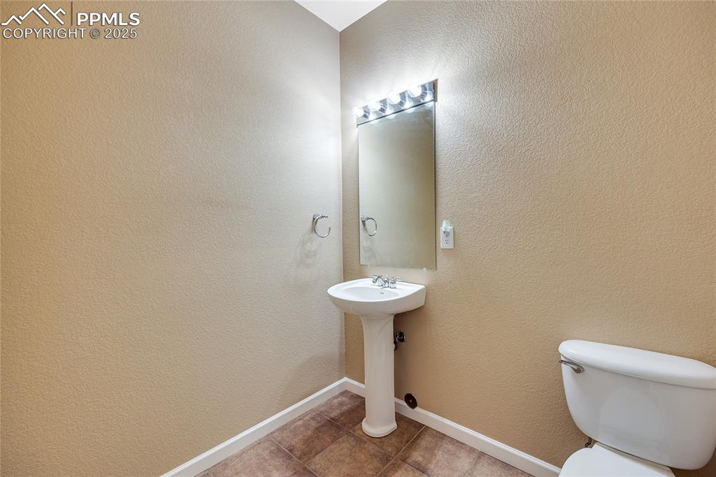 Image 7 of 34: 1st Floor Half Bath