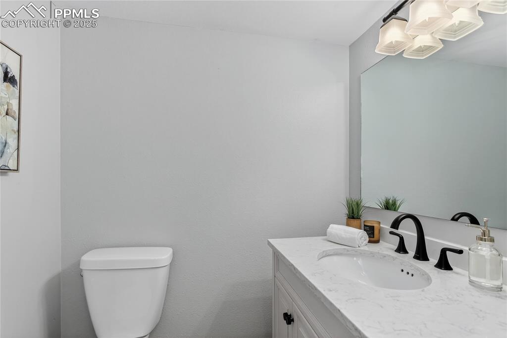 Image 13 of 32: Powder room - main level