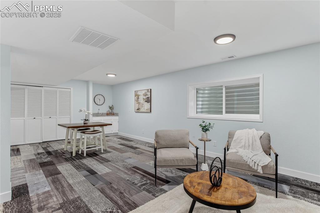 Image 22 of 32: Spacious rec room w/ wet bar