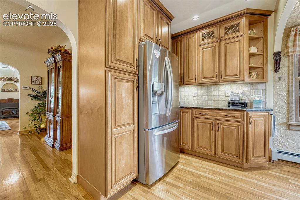 Image 11 of 48: COVED CEILINGS, HARDWOOD FLOORS