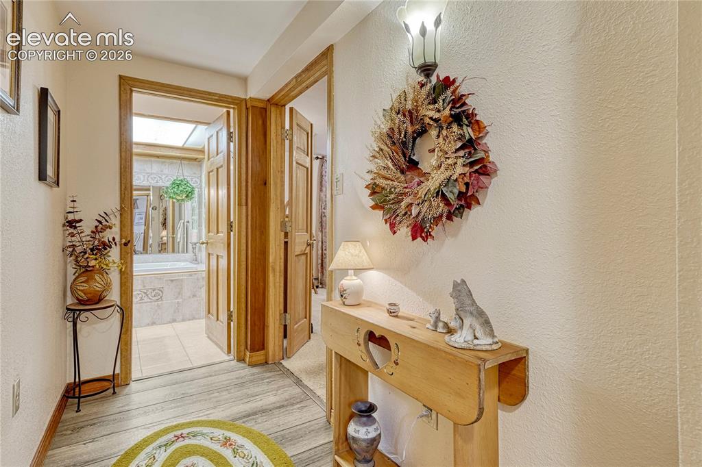 Image 33 of 48: LOWER LEVEL FAMILY ROOM, LVT FLOORING