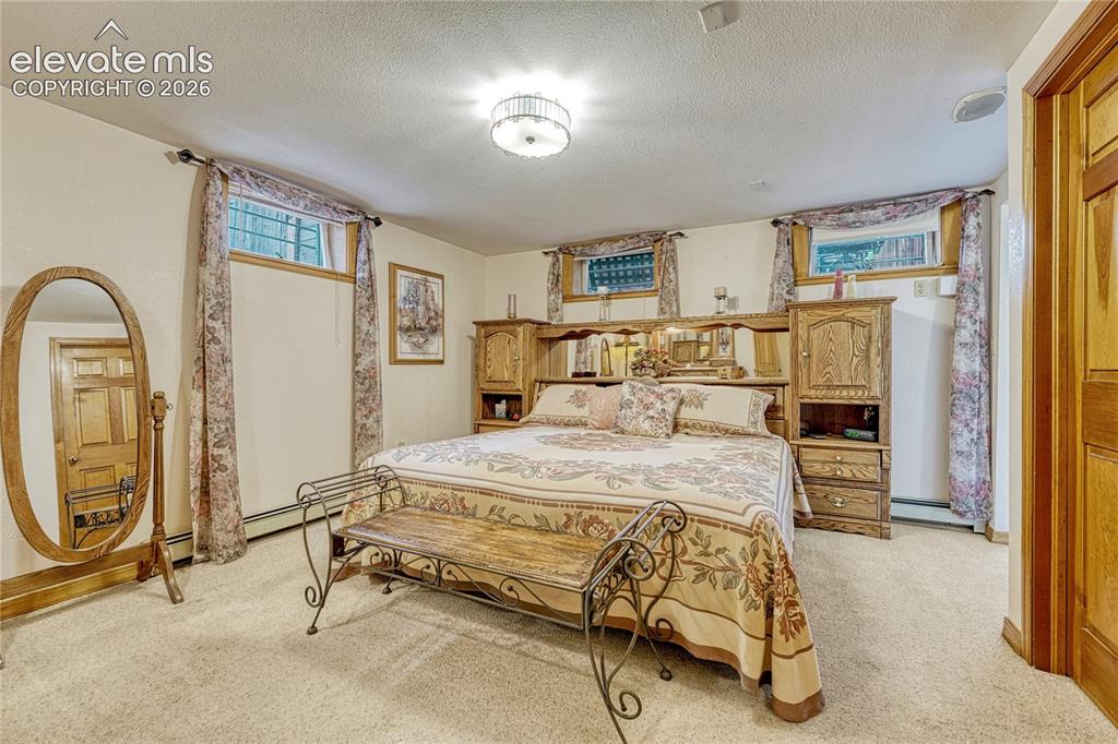Image 34 of 48: LOWER LEVEL FAMILY ROOM, LVT FLOORING