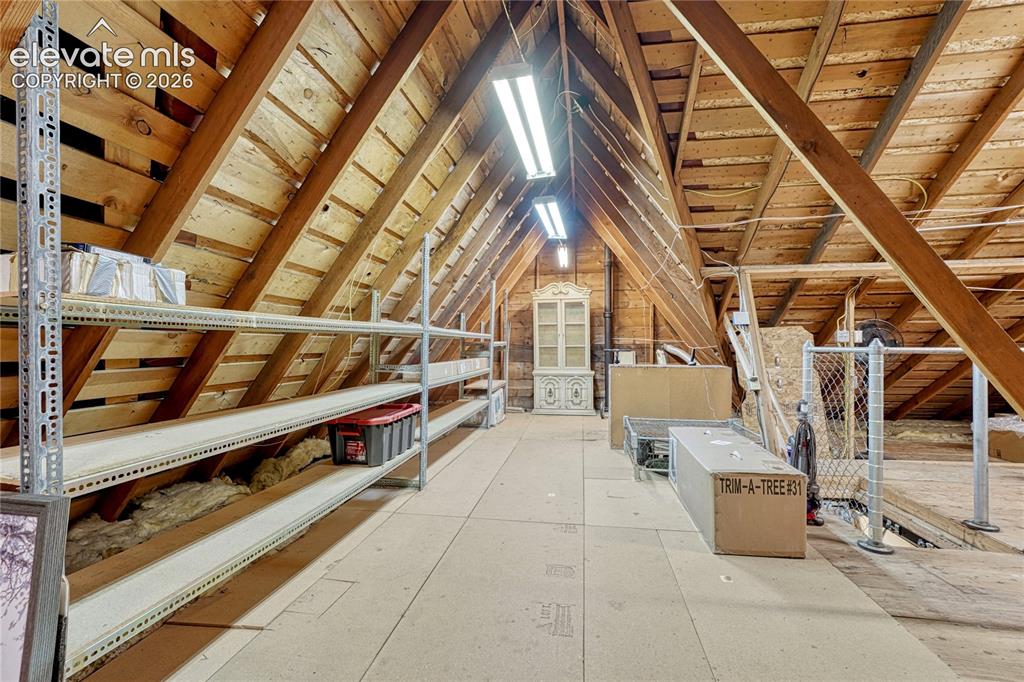 Image 38 of 48: LARGE LAUNDRY ROOM, W/D INCLUDED, COUNTER, CABINETS & IRONING BOARD