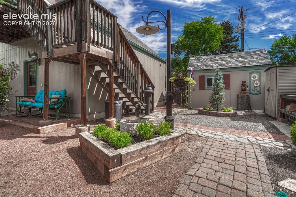 Image 41 of 48: WALKOUT & UP TO REAR YARD