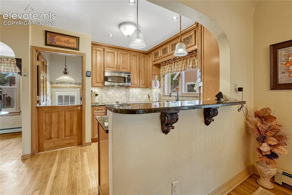 Image 7 of 48: COVED CEILINGS, HARDWOOD FLOORS