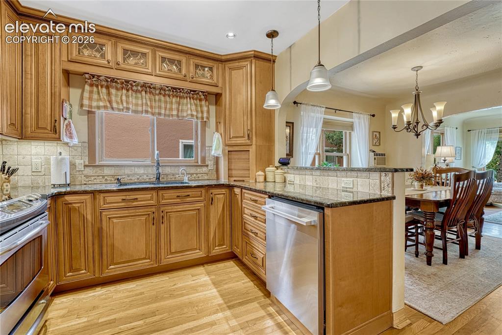 Image 9 of 48: COVED CEILINGS, HARDWOOD FLOORS