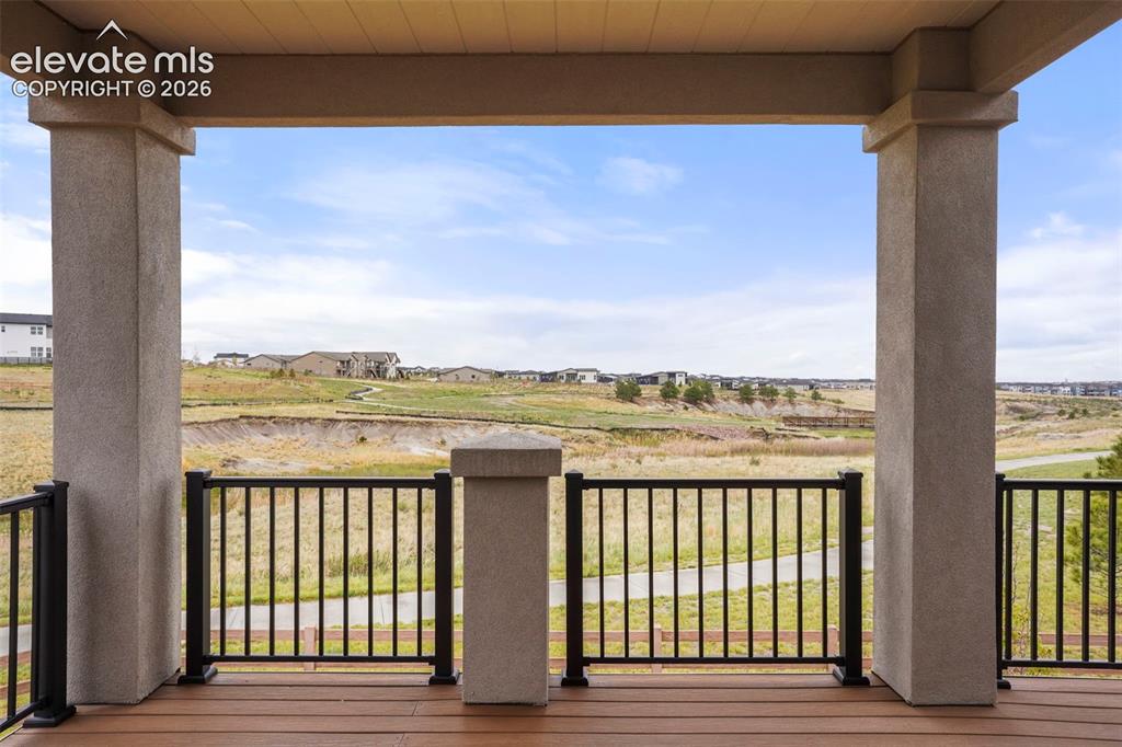 Image 10 of 48: Serene setting with lovely views of the neighborhood open space and trail
