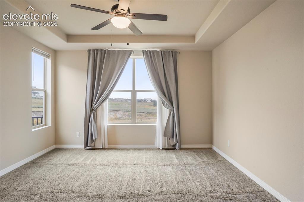 Image 13 of 48: Master Bedroom with views of the open space