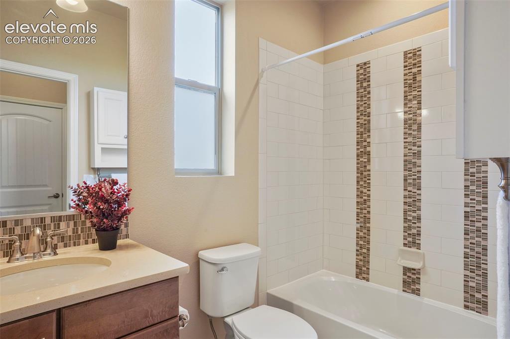 Image 19 of 48: Full Hall Bath on main level