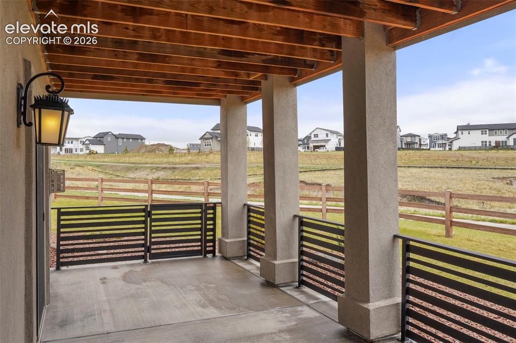 Image 24 of 48: Spacious 24x10 Patio in lovely setting with views of the open space