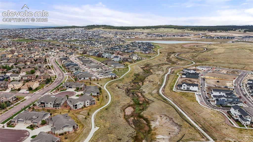 Image 38 of 48: Located just blocks away from Wolf Lake with fishing and water sport access