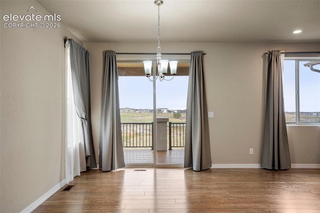 Image 8 of 48: Walkout from Dining Area to deck