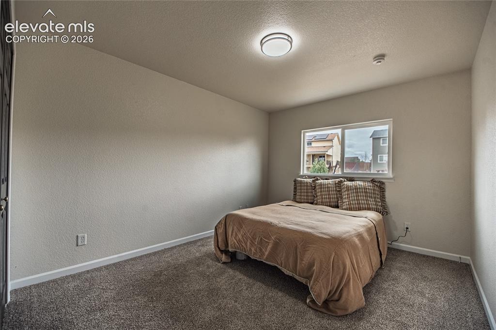 Image 10 of 38: Bedroom