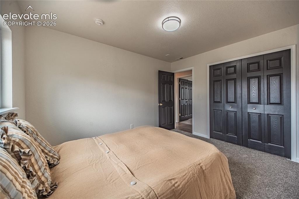 Image 11 of 38: Bedroom