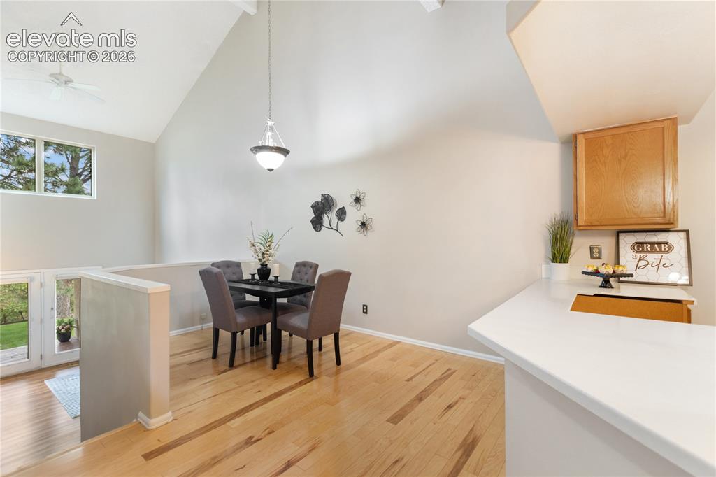 Image 14 of 34: Kitchen into dining area