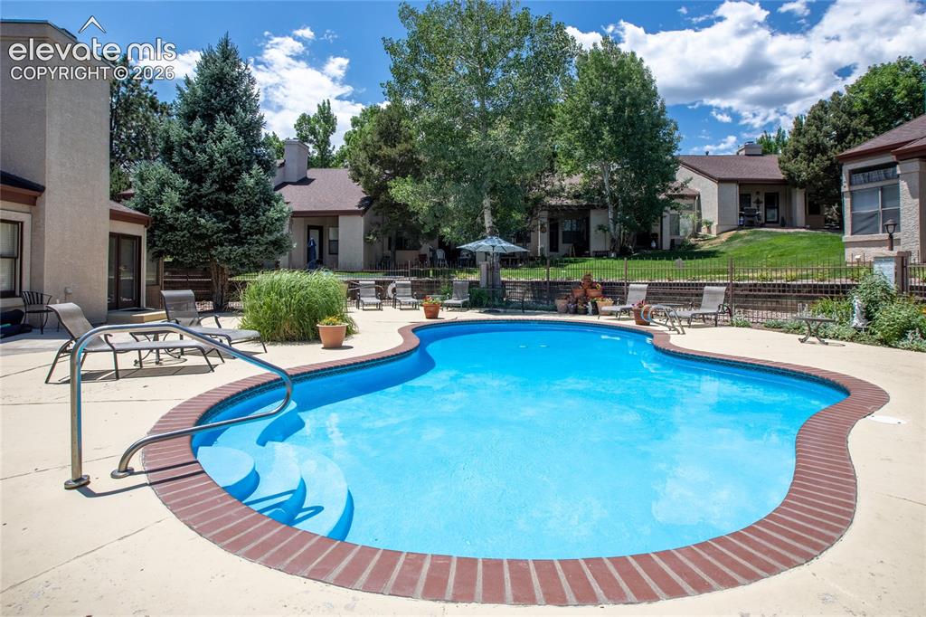 Image 33 of 34: Pool area with secure entry