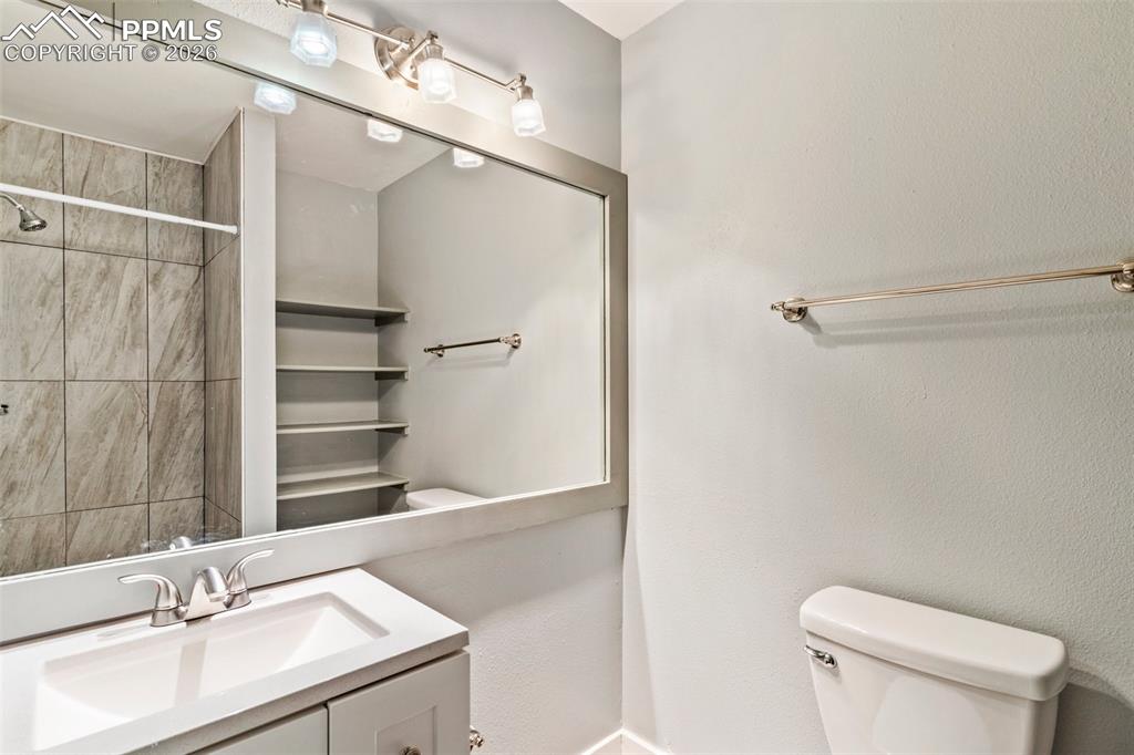 Image 17 of 35: Full bath with vanity and a tub/shower