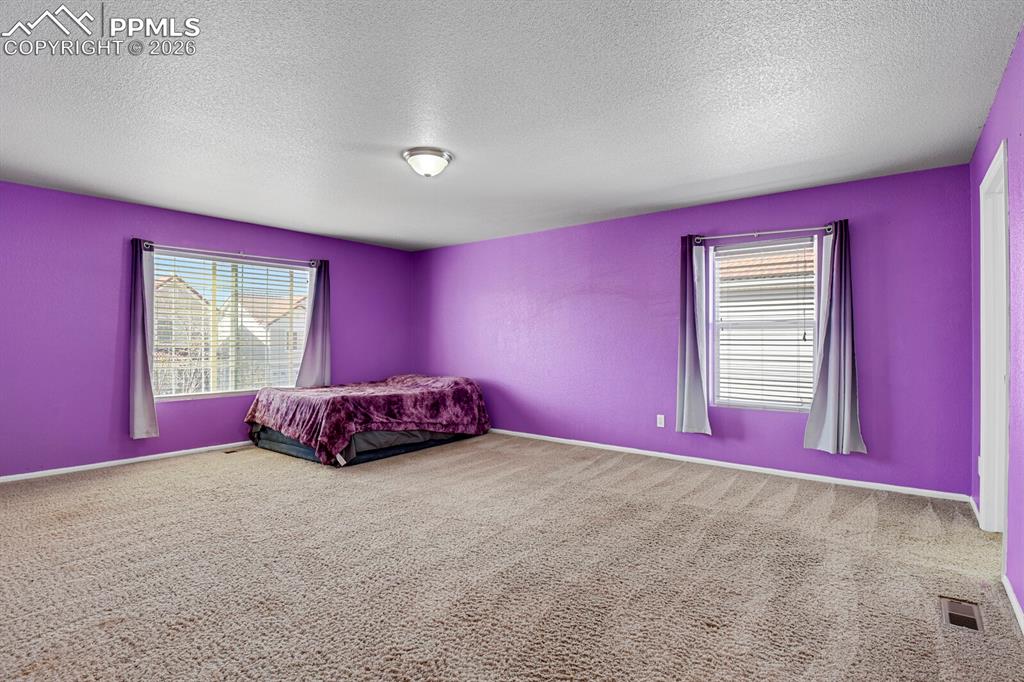 Image 27 of 50: Master Bedroom