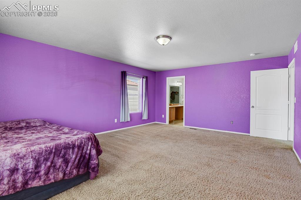 Image 28 of 50: Master Bedroom