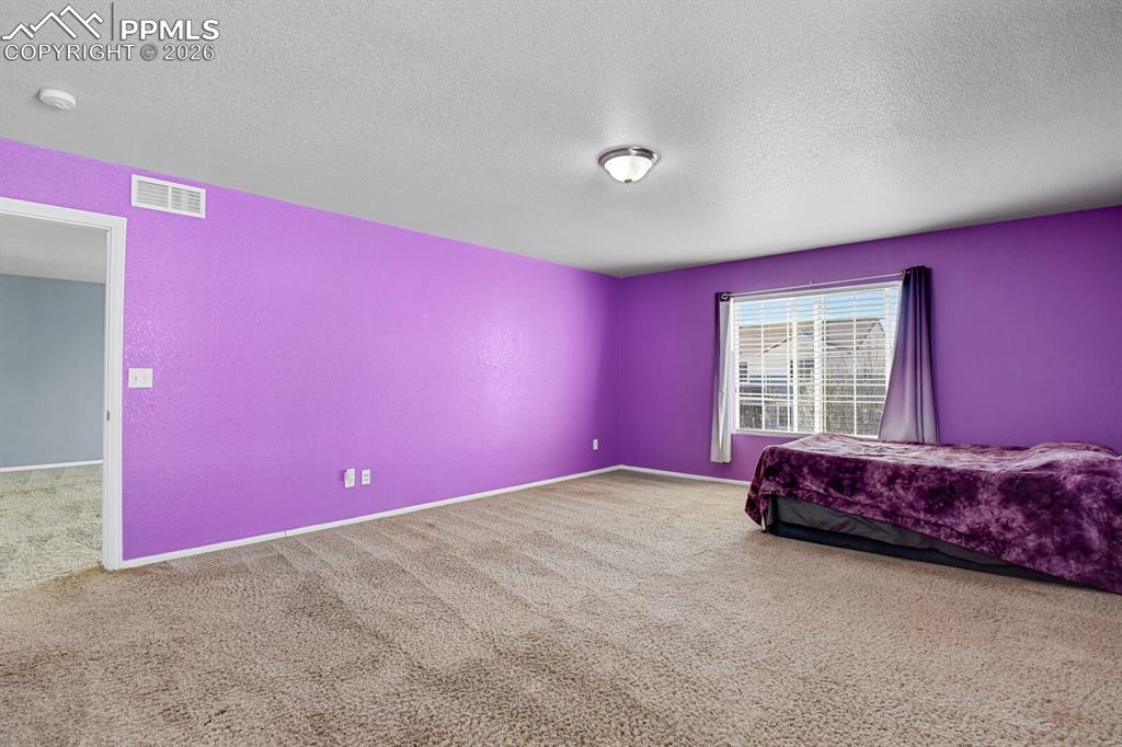 Image 29 of 50: Master Bedroom