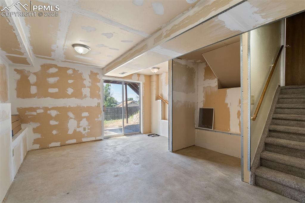 Image 35 of 47: Walk-out. Plumbed for bathroom.