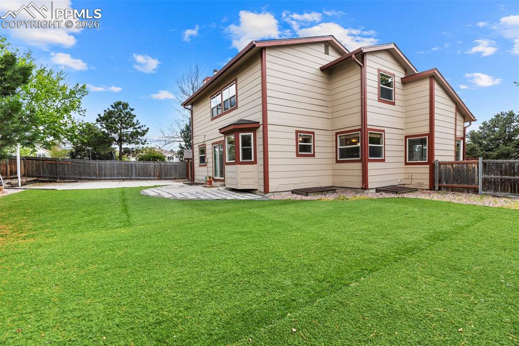 Image 4 of 43: Turf in backyard - easy maintenance! 