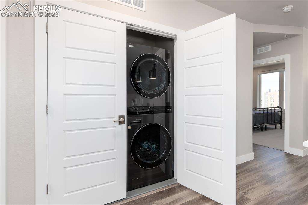 Image 21 of 21: stacked washer / dryer