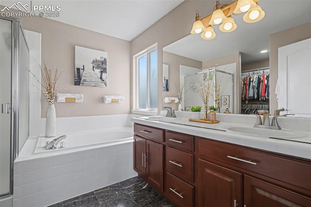 Image 28 of 49: Master Bathroom