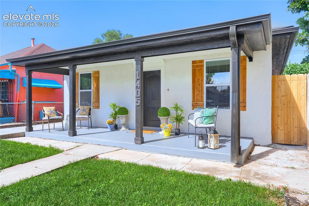 Image 2 of 49: Another front view of this beautiful, contemporary home!