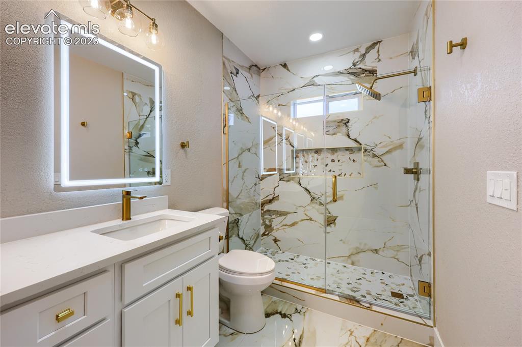 Image 22 of 49: Spectacular 4-piece, spa-inspired primary ensuite bathroom with a marble sh