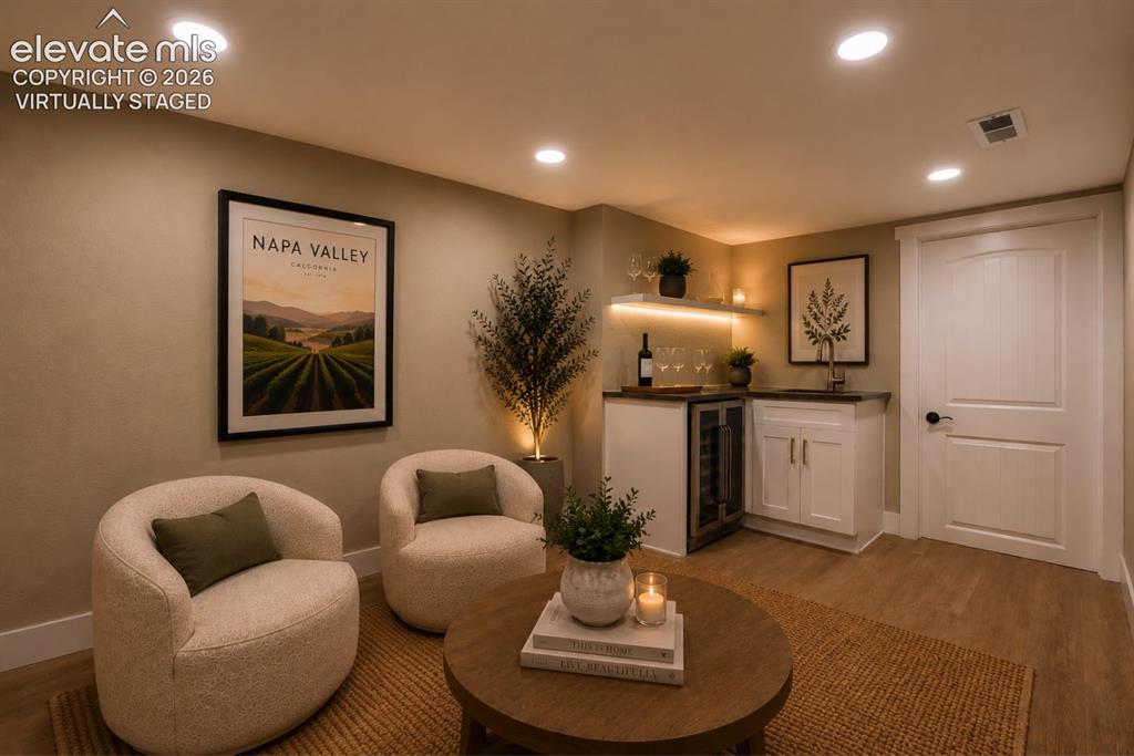 Image 39 of 49: And here is this comfortable den, virtually staged.